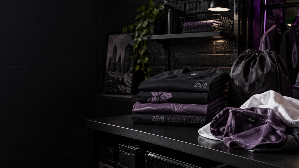 Folded graphic shirts and a garment care bag