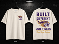 Louisiana State University Built Different cream T-shirt mockup showing the front chest print and large back graphic, with unprinted sleeves.