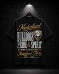Nederland Bulldogs Pride & Spirit Tee on the 25/8 matte black brick studio background with black hanger and overhead spotlight