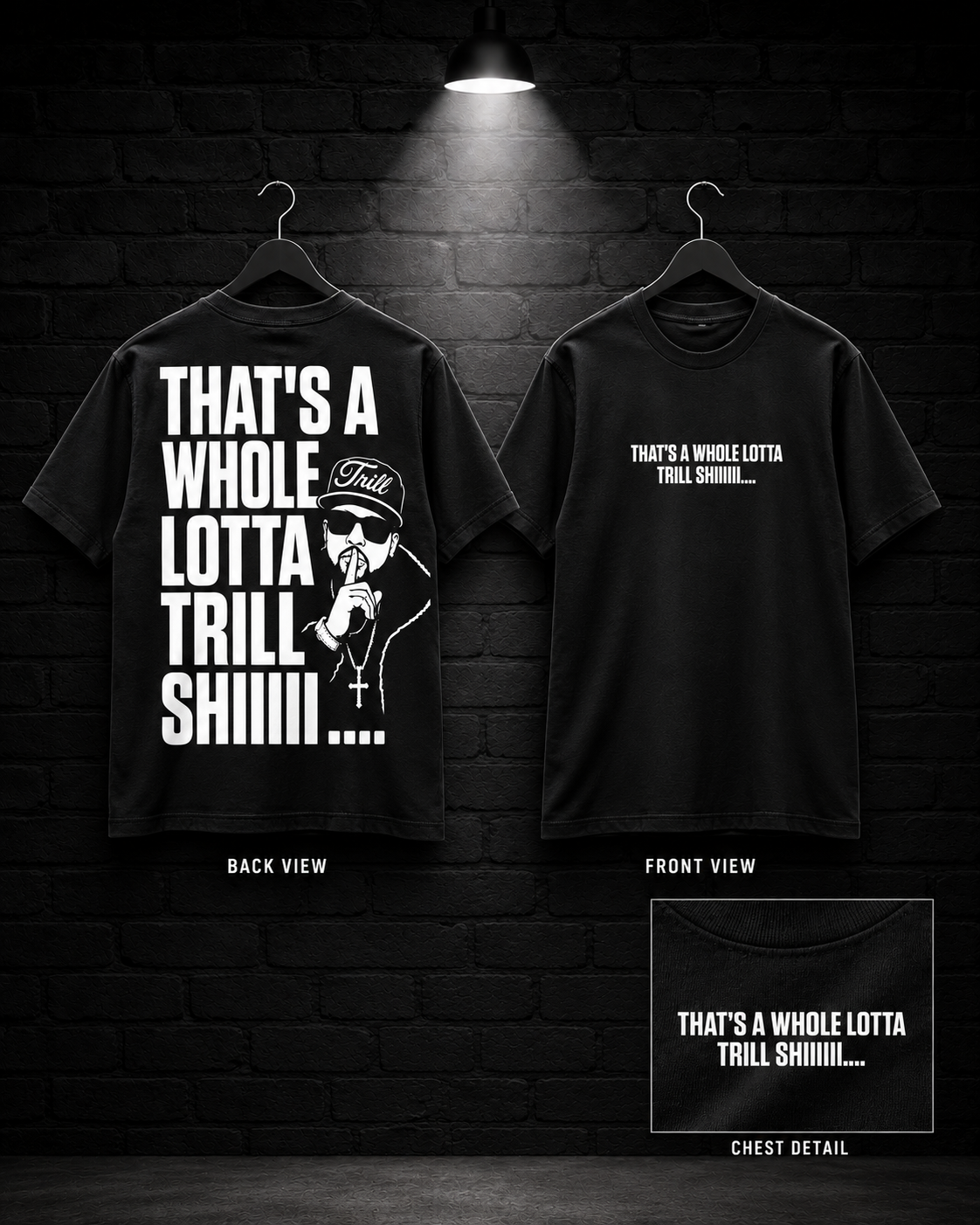Whole Lotta Trill Graphic Tee on the 25/8 matte black brick studio background with black hangers and overhead spotlight