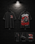 Memorial Titans Stand on Business Tee mockup in black / charcoal appearance, showing small chest graphic and large back graphic.